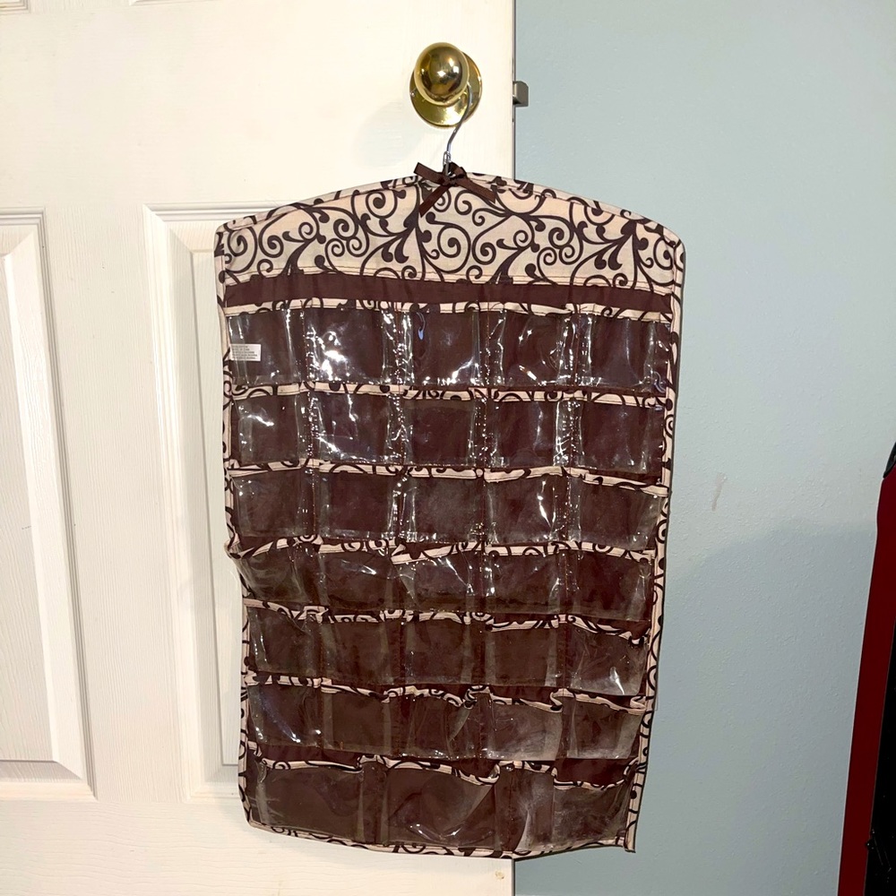 Hanging 66 piece jewelry or makeup organizer